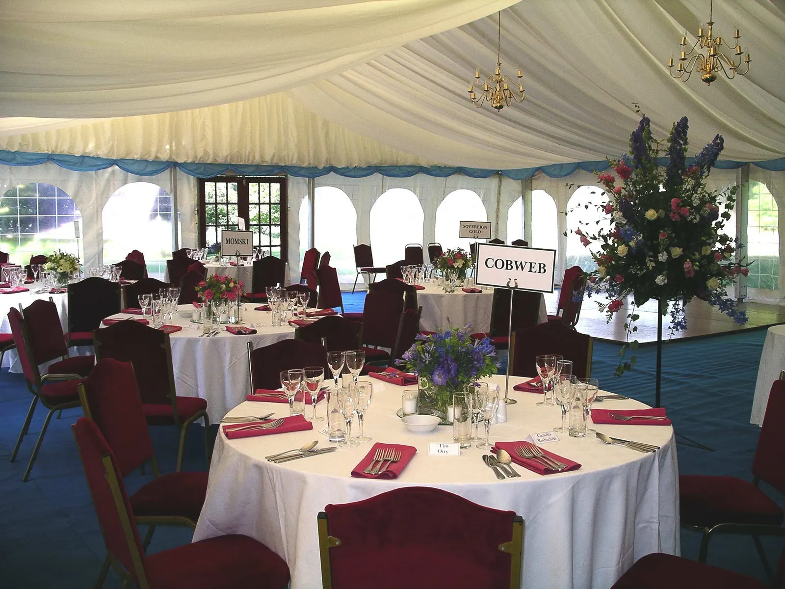 Round tables with burgundy chairs