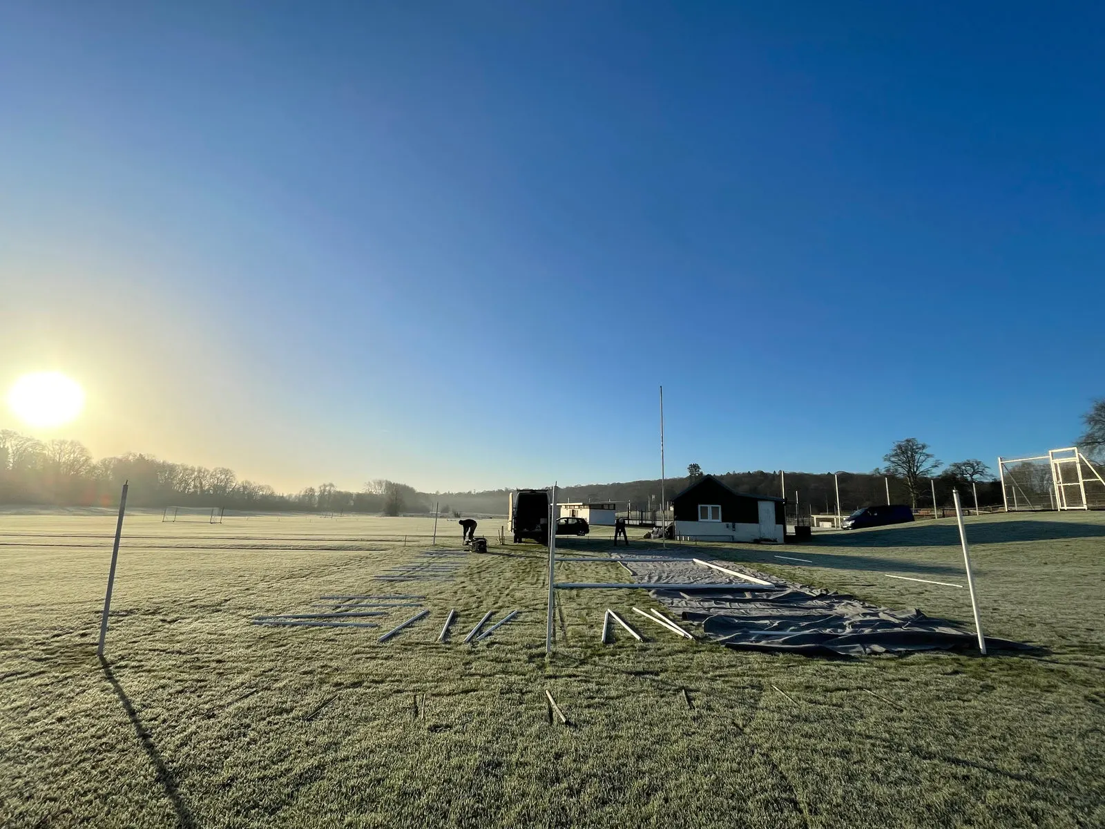Pitching a marquee on a frosty morning