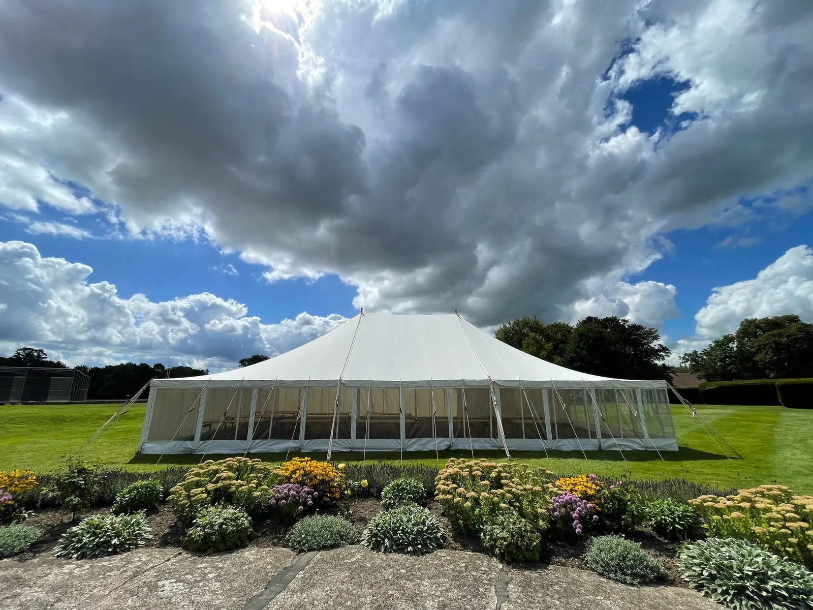 Traditional marquee under a dramatic summer sky